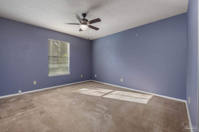 2201 Scenic Hwy Unit M1, Pensacola, FL 32503 - empty room featuring ceiling fan, carpet floors, baseboards, and a textured ceiling