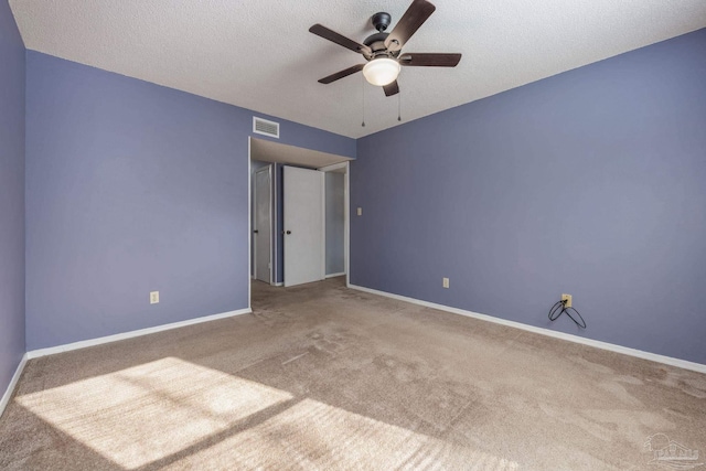 2201 Scenic Hwy Unit M1, Pensacola, FL 32503 - carpeted spare room with a ceiling fan, baseboards, and a textured ceiling