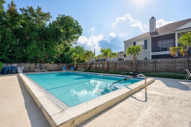 2201 Scenic Hwy Unit M1, Pensacola, FL 32503 - community pool featuring a fenced backyard and a patio