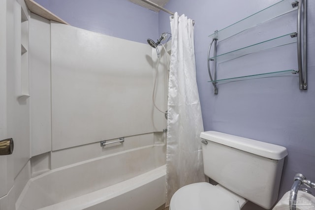 2201 Scenic Hwy Unit M1, Pensacola, FL 32503 - bathroom featuring toilet and shower / bathtub combination with curtain
