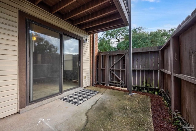 2201 Scenic Hwy Unit M1, Pensacola, FL 32503 - view of patio / terrace with fence and a gate
