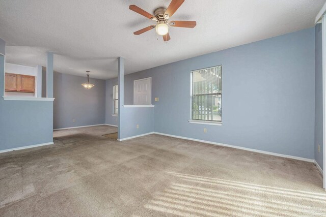 2201 Scenic Hwy Unit M1, Pensacola, FL 32503 - empty room featuring carpet floors, a ceiling fan, and baseboards