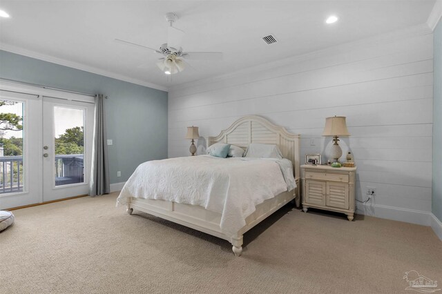 carpeted bedroom with access to exterior, ornamental molding, french doors, and ceiling fan