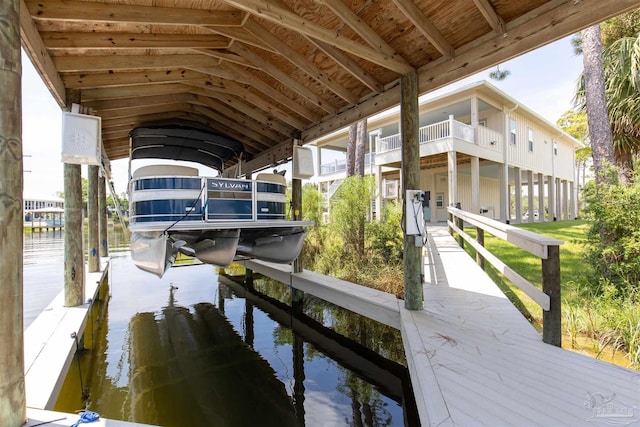 view of dock with a water view