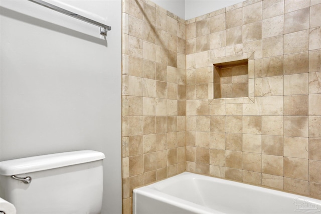 full bathroom featuring a bathtub and toilet