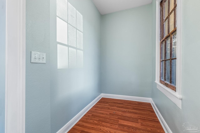 spare room featuring hardwood / wood-style floors