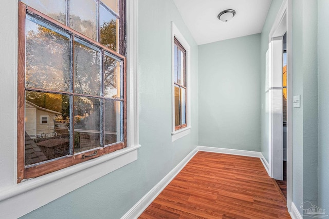 hall featuring hardwood / wood-style flooring