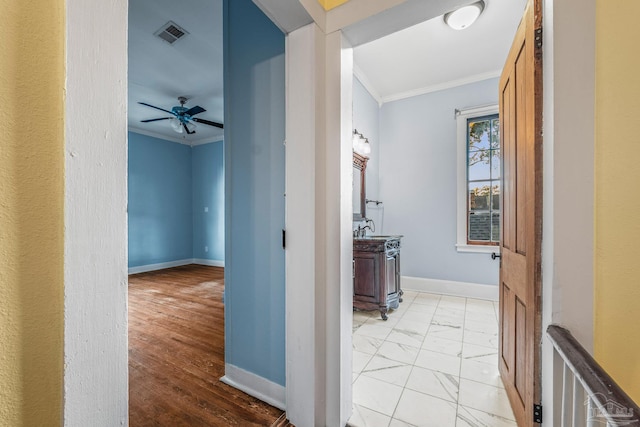 hallway with ornamental molding