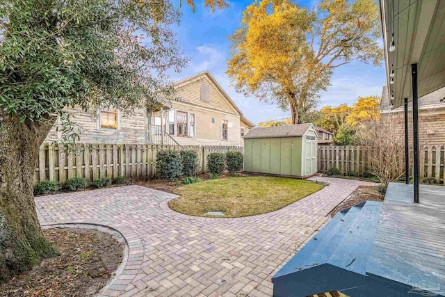 view of patio with a shed