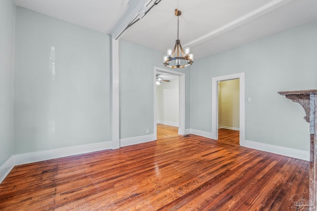 interior space featuring hardwood / wood-style floors and a notable chandelier