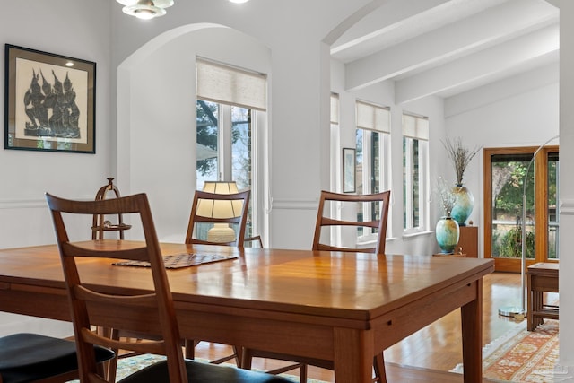 dining room featuring beam ceiling