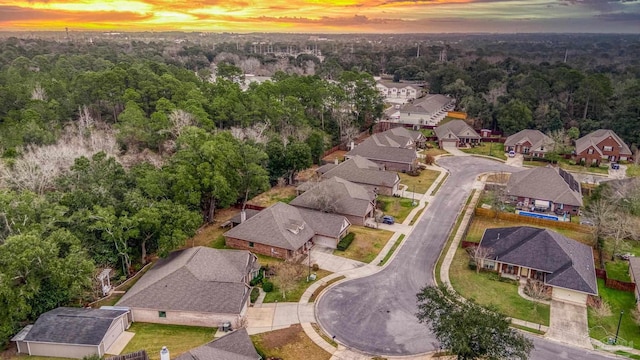 aerial view at dusk with a residential view