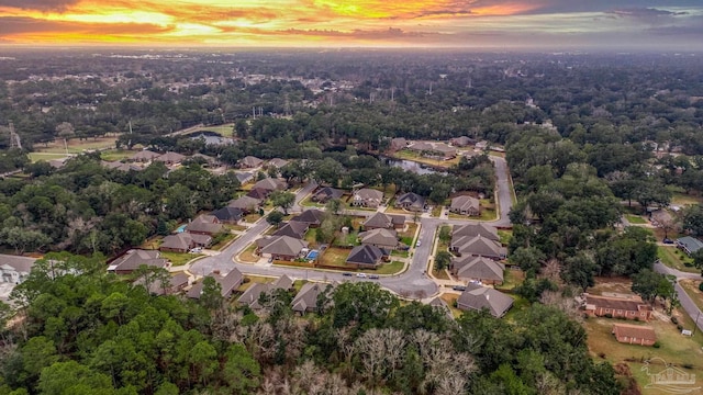 aerial view at dusk with a residential view