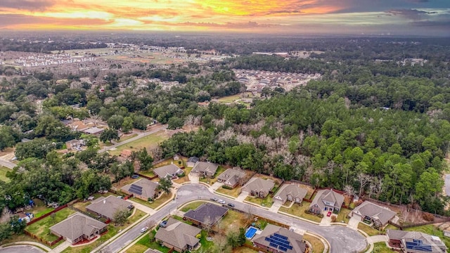 aerial view at dusk with a residential view