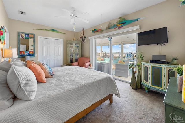 bedroom featuring access to exterior, a closet, carpet flooring, a ceiling fan, and visible vents