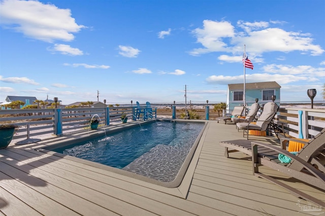view of pool featuring a deck