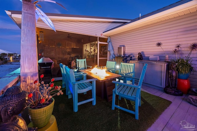 view of patio with a fire pit