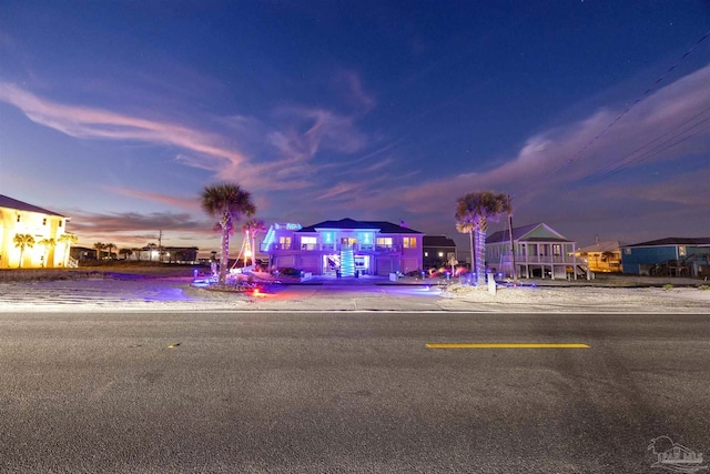 view of front of property featuring playground community