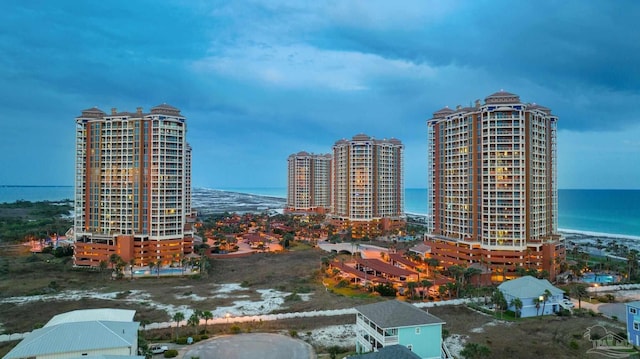 city view featuring a beach view and a water view