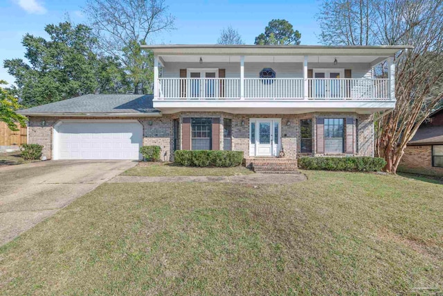 front of property with brick siding, concrete driveway, an attached garage, a balcony, and a front lawn