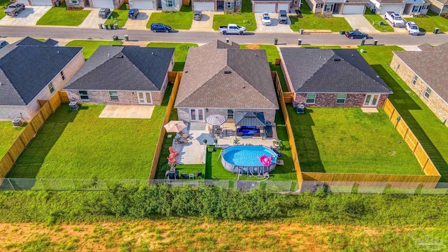 drone / aerial view featuring a residential view