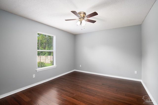 7292 Broadmoor St, Navarre, FL 32566 - empty room featuring ceiling fan and dark wood-type flooring