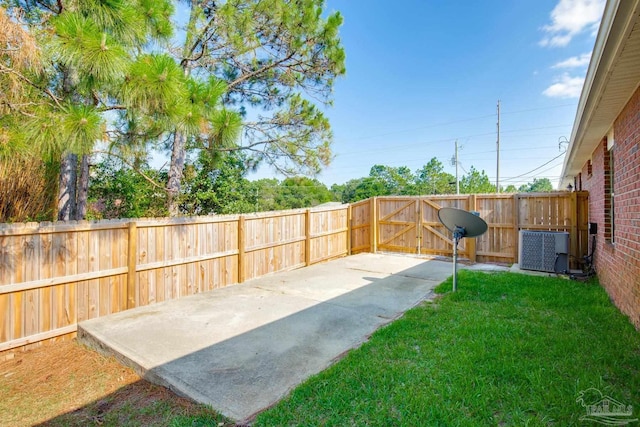 7292 Broadmoor St, Navarre, FL 32566 - fenced backyard featuring a patio area and a gate