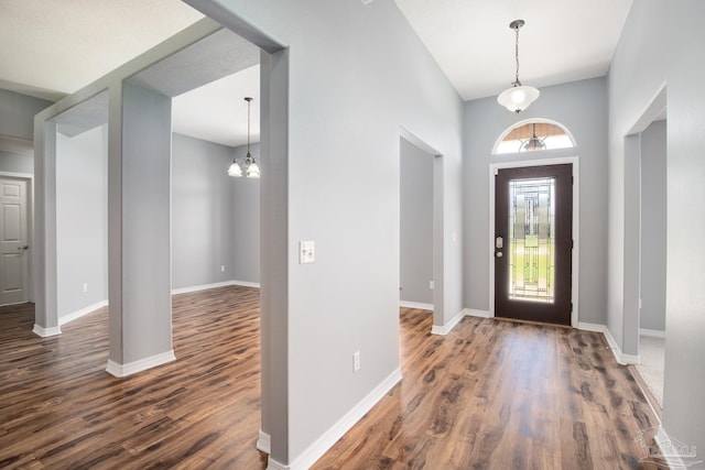 7292 Broadmoor St, Navarre, FL 32566 - foyer with wood finished floors and a chandelier