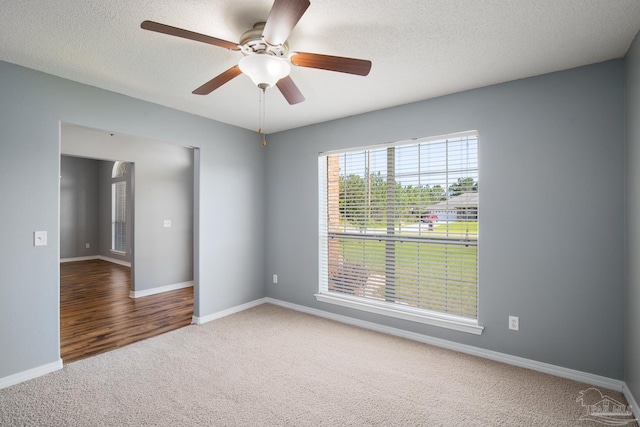 7292 Broadmoor St, Navarre, FL 32566 - carpeted empty room featuring ceiling fan and a textured ceiling