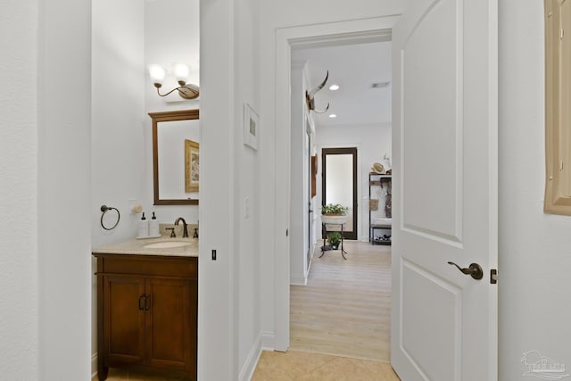 bathroom with tile patterned floors, vanity, visible vents, and recessed lighting