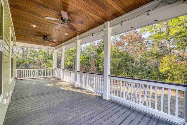 wooden deck with ceiling fan