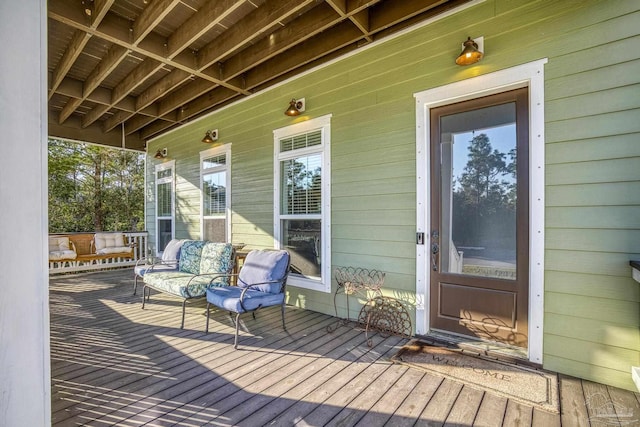 deck featuring covered porch