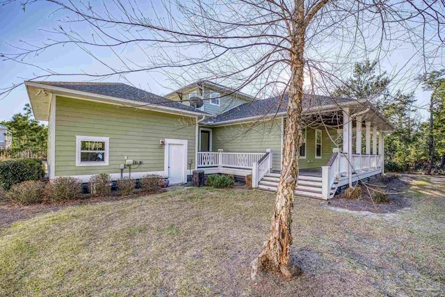 rear view of house with a deck