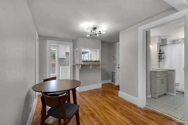 corridor featuring light hardwood / wood-style flooring