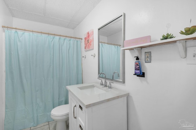 bathroom featuring tile patterned flooring, vanity, toilet, and a shower with shower curtain