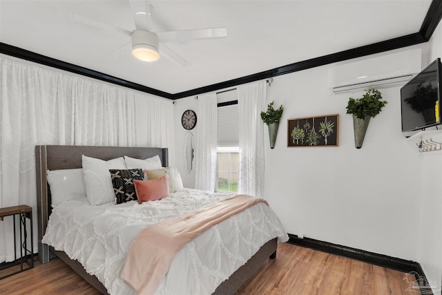 bedroom with ceiling fan, ornamental molding, dark hardwood / wood-style flooring, and an AC wall unit