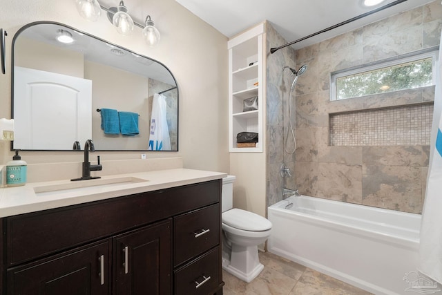 full bathroom featuring vanity, toilet, and shower / tub combo