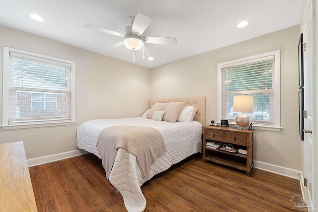 bedroom featuring dark wood-type flooring and ceiling fan