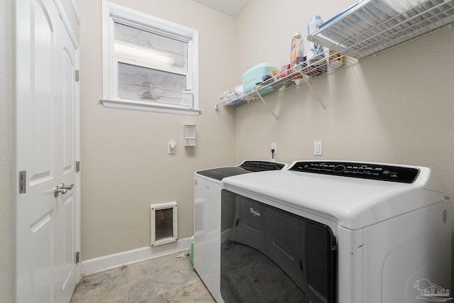 clothes washing area with independent washer and dryer