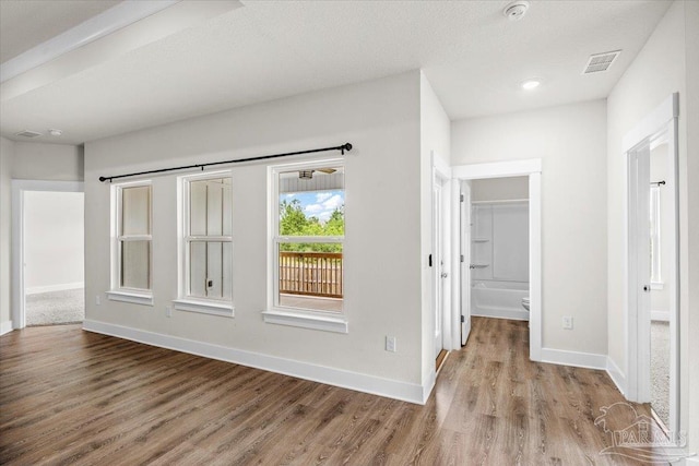 10826 Blacktail Loop, Pensacola, FL 32526 - corridor with wood finished floors, baseboards, and recessed lighting