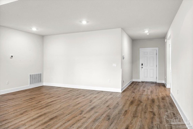 10826 Blacktail Loop, Pensacola, FL 32526 - unfurnished room featuring wood finished floors, recessed lighting, and baseboards