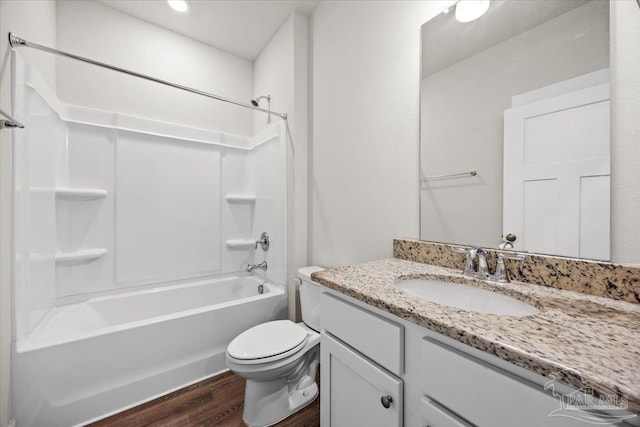 10826 Blacktail Loop, Pensacola, FL 32526 - full bath with wood finished floors, vanity, toilet, and washtub / shower combination