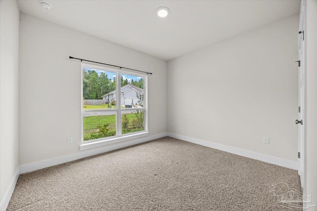 10826 Blacktail Loop, Pensacola, FL 32526 - carpeted empty room featuring baseboards