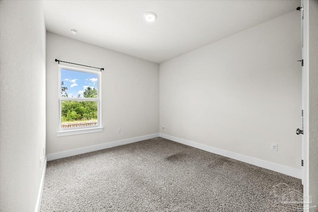 10826 Blacktail Loop, Pensacola, FL 32526 - spare room featuring carpet floors, baseboards, and a smoke detector