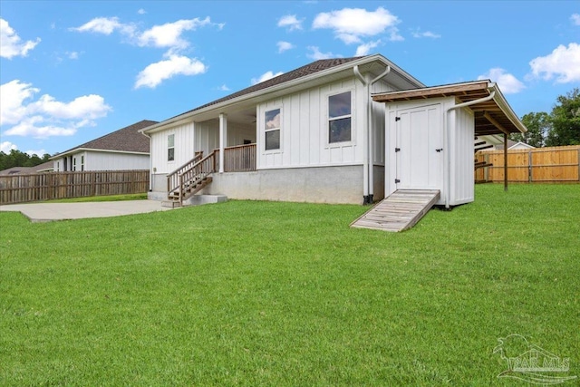 10826 Blacktail Loop, Pensacola, FL 32526 - rear view of property featuring board and batten siding and a patio