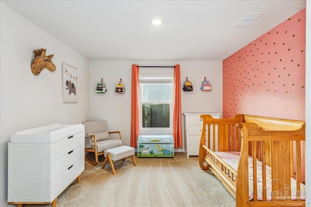 bedroom with light carpet