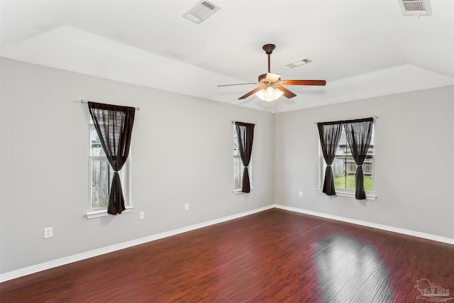 unfurnished room featuring ceiling fan, visible vents, and plenty of natural light