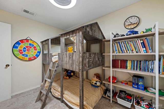 bedroom with carpet and visible vents