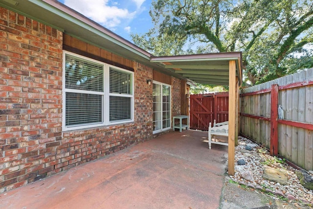 view of patio with fence