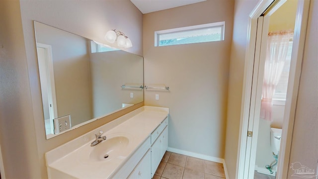 bathroom with vanity and tile patterned flooring